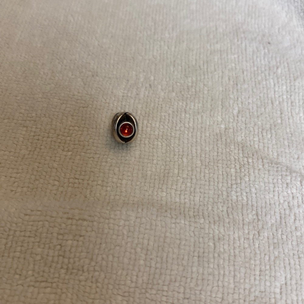 Pandora charm with red stone